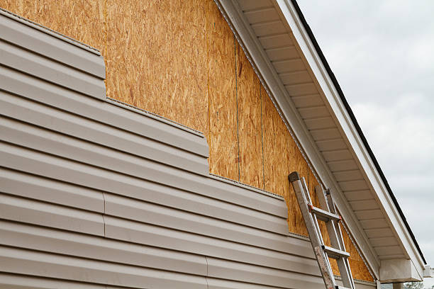 Professional Emergency Siding Repair technician working in Linden, NC